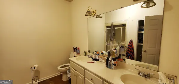 a view of a closet with storage