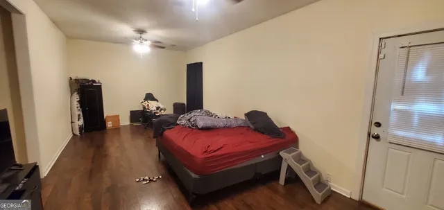 a kitchen with stainless steel appliances granite countertop wooden cabinets and a stove top oven