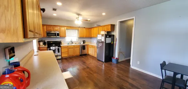 a view of a livingroom with furniture