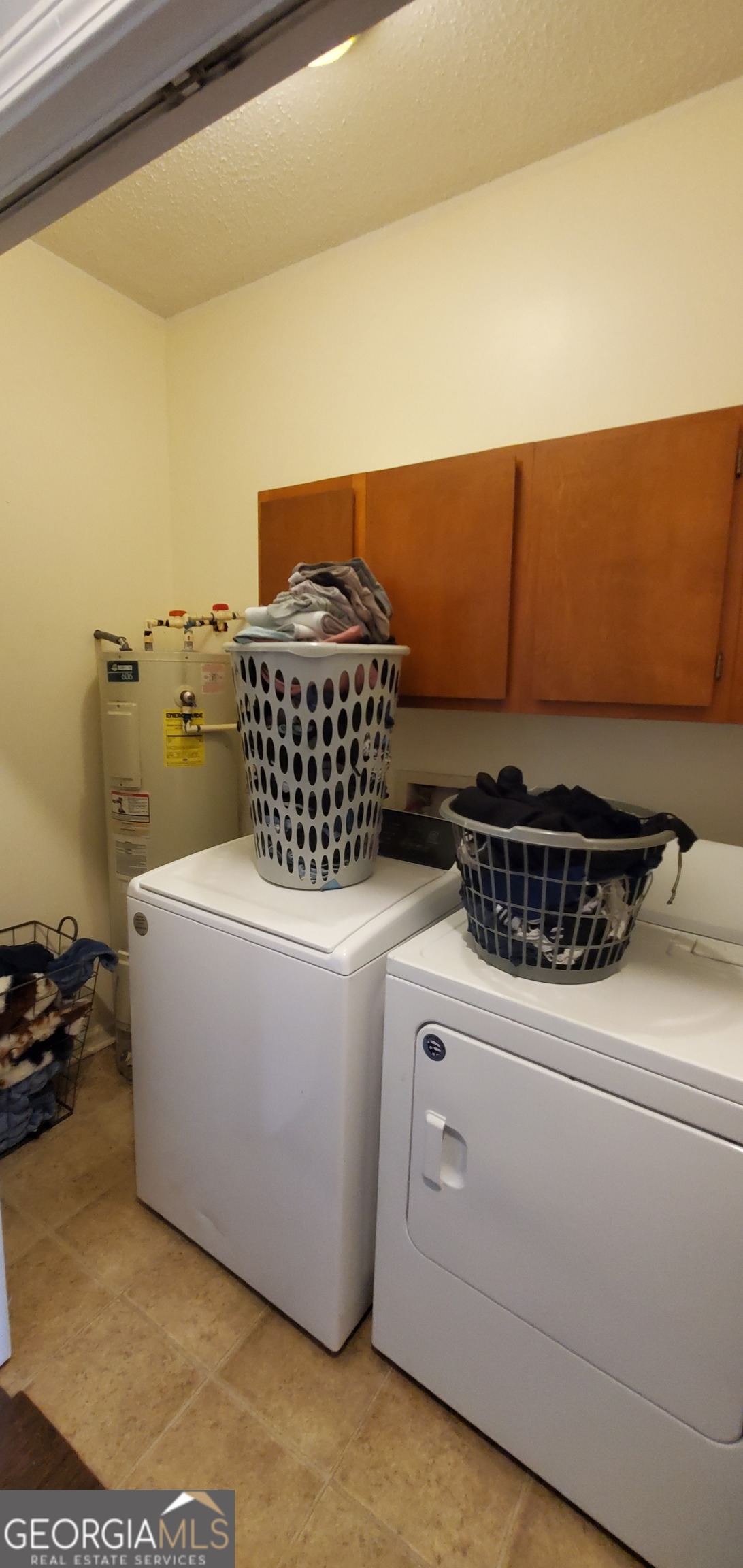 38 Highway 46 Lyons, GA 30436 - Photo 10 of 44 a utility room with dryer and washer
