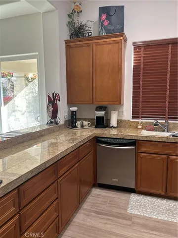 a kitchen with sink and window