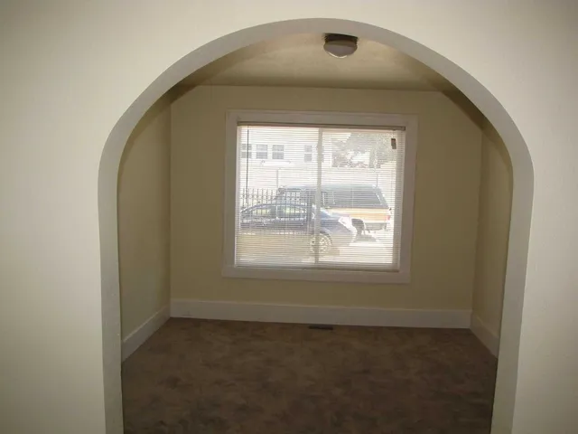 an empty room with a window