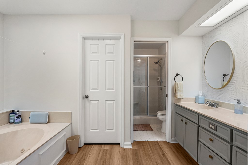 6831 Beaver Trail Midland, GA 31820 - Photo 16 of 24 a bathroom with a sink a toilet and shower