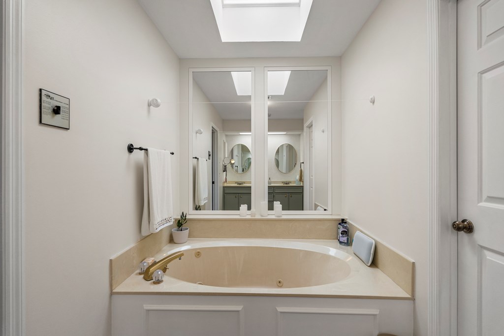 6831 Beaver Trail Midland, GA 31820 - Photo 18 of 24 a bathroom with a tub and shower