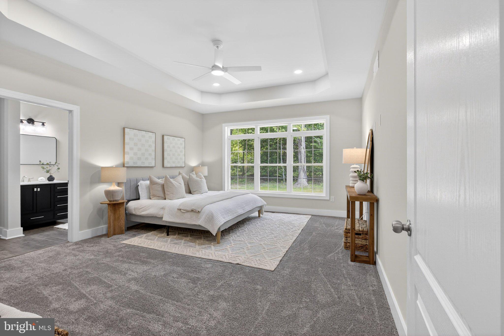 164 Pine Tree Road Townsend, DE 19734 - Photo 54 of 84 a spacious bedroom with a bed and a large window
