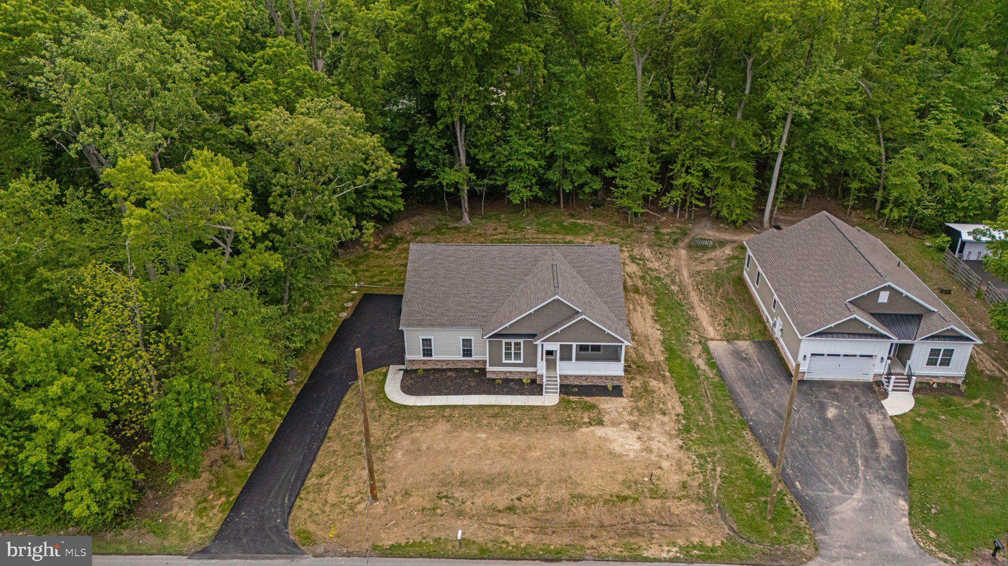 164 Pine Tree Road Townsend, DE 19734 - Photo 81 of 84 an aerial view of a house with swimming pool garden and patio