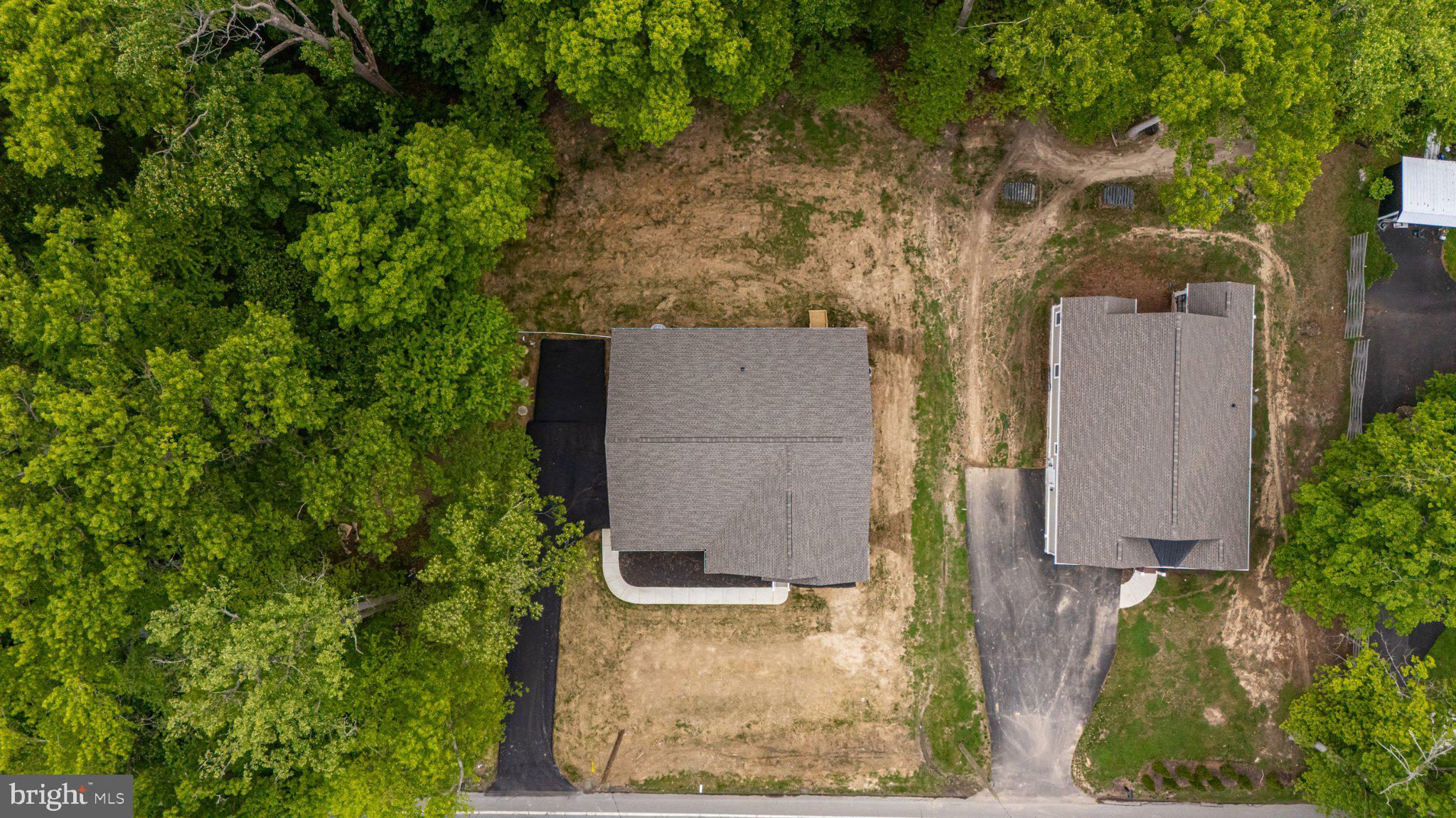 164 Pine Tree Road Townsend, DE 19734 - Photo 82 of 84 an aerial view of residential house with outdoor space and trees
