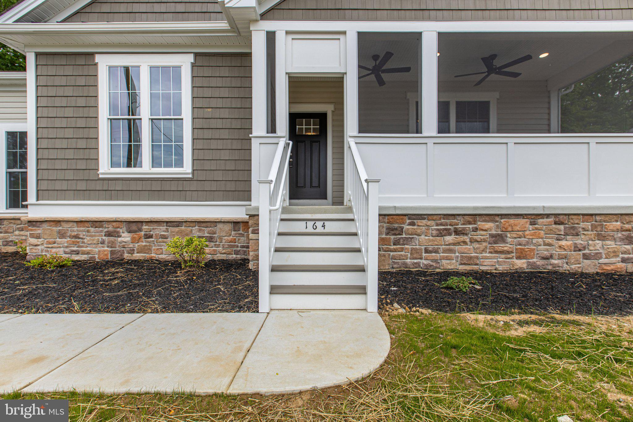 164 Pine Tree Road Townsend, DE 19734 - Photo 9 of 84 Charming entrance with modern appeal.