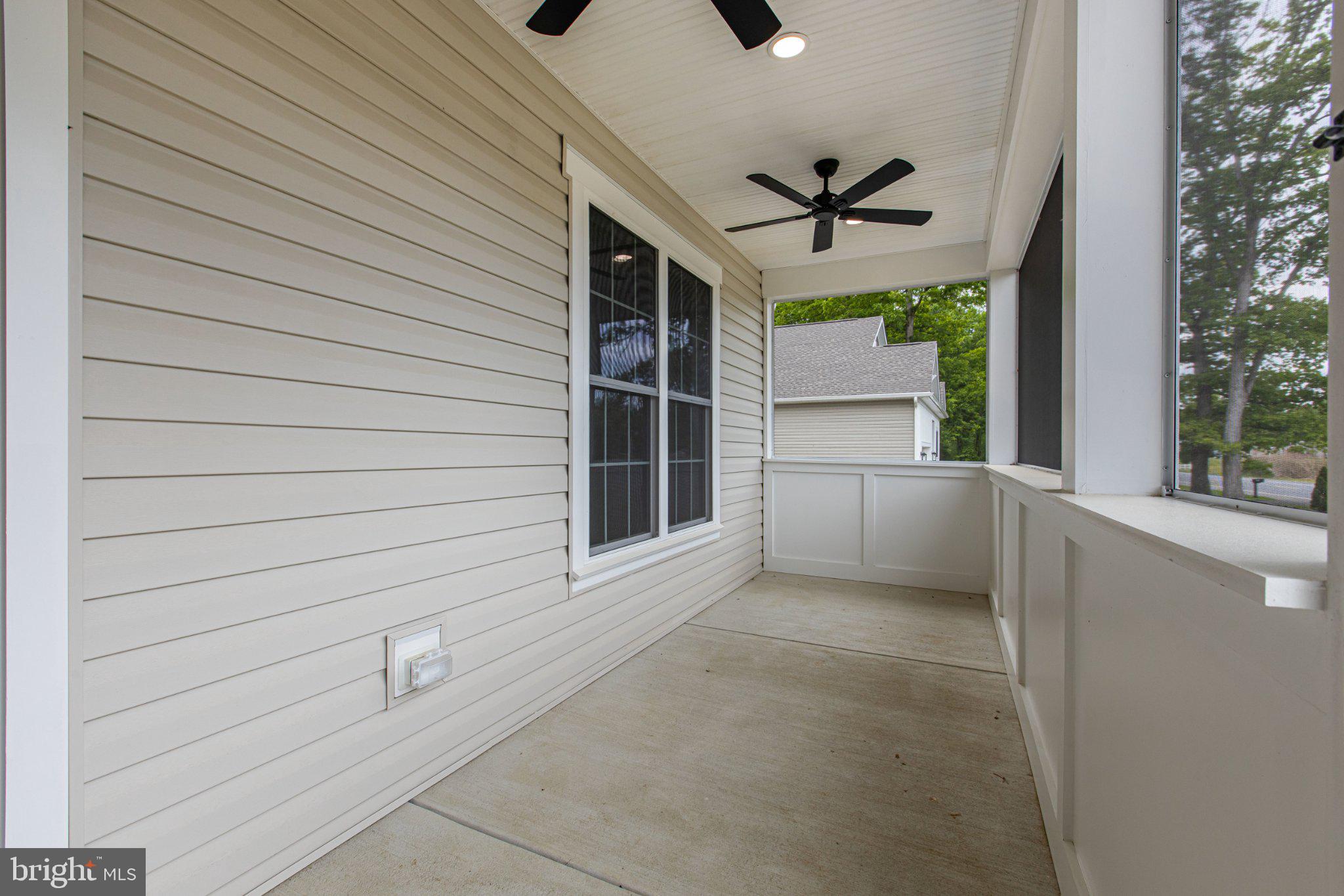 164 Pine Tree Road Townsend, DE 19734 - Photo 10 of 84 a view of a terrace with a ceiling fan and window