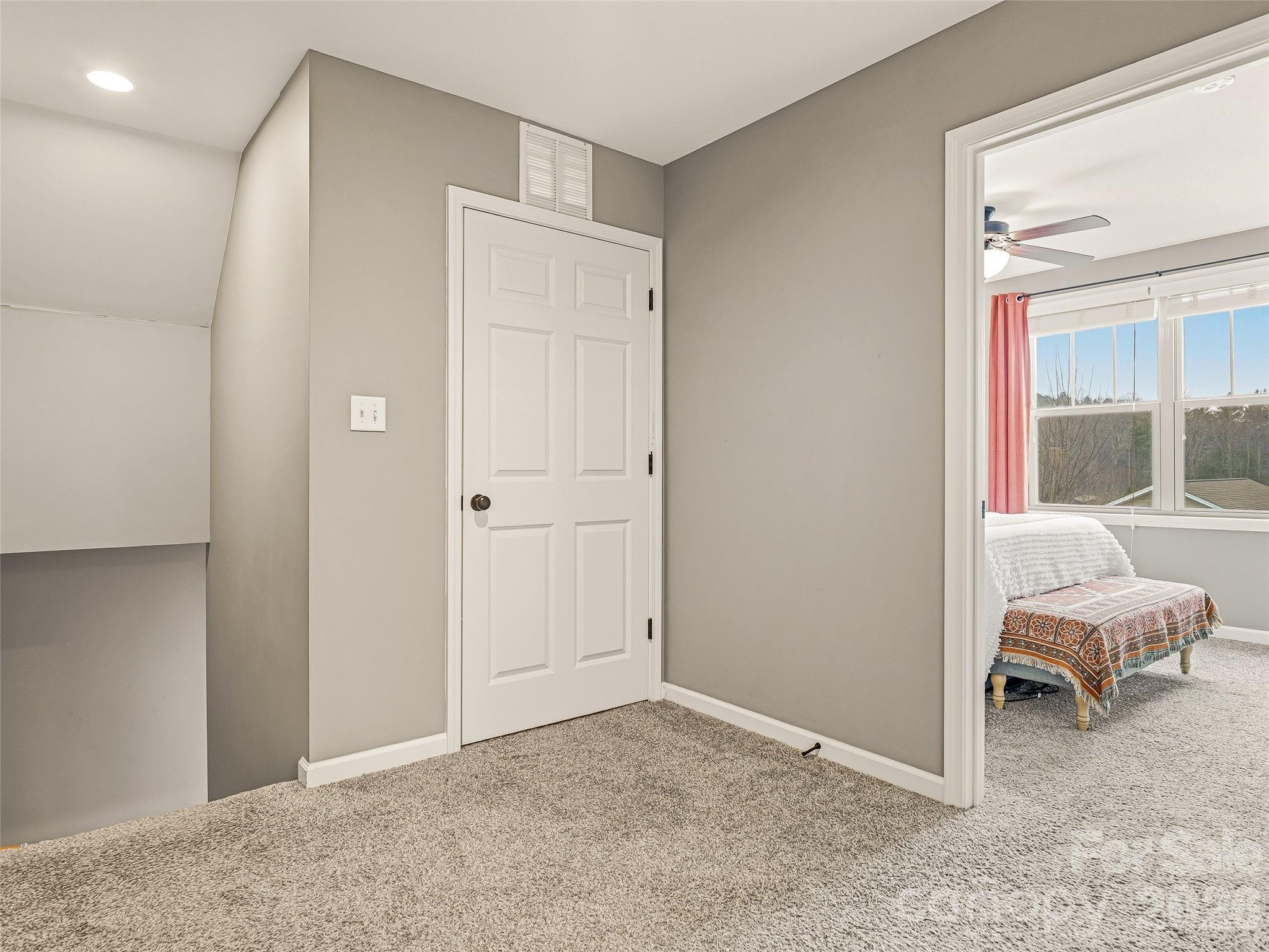 21 Yarrow Meadow Road Weaverville, NC 28787 - Photo 19 of 38 a view of a bedroom with bed and hallway