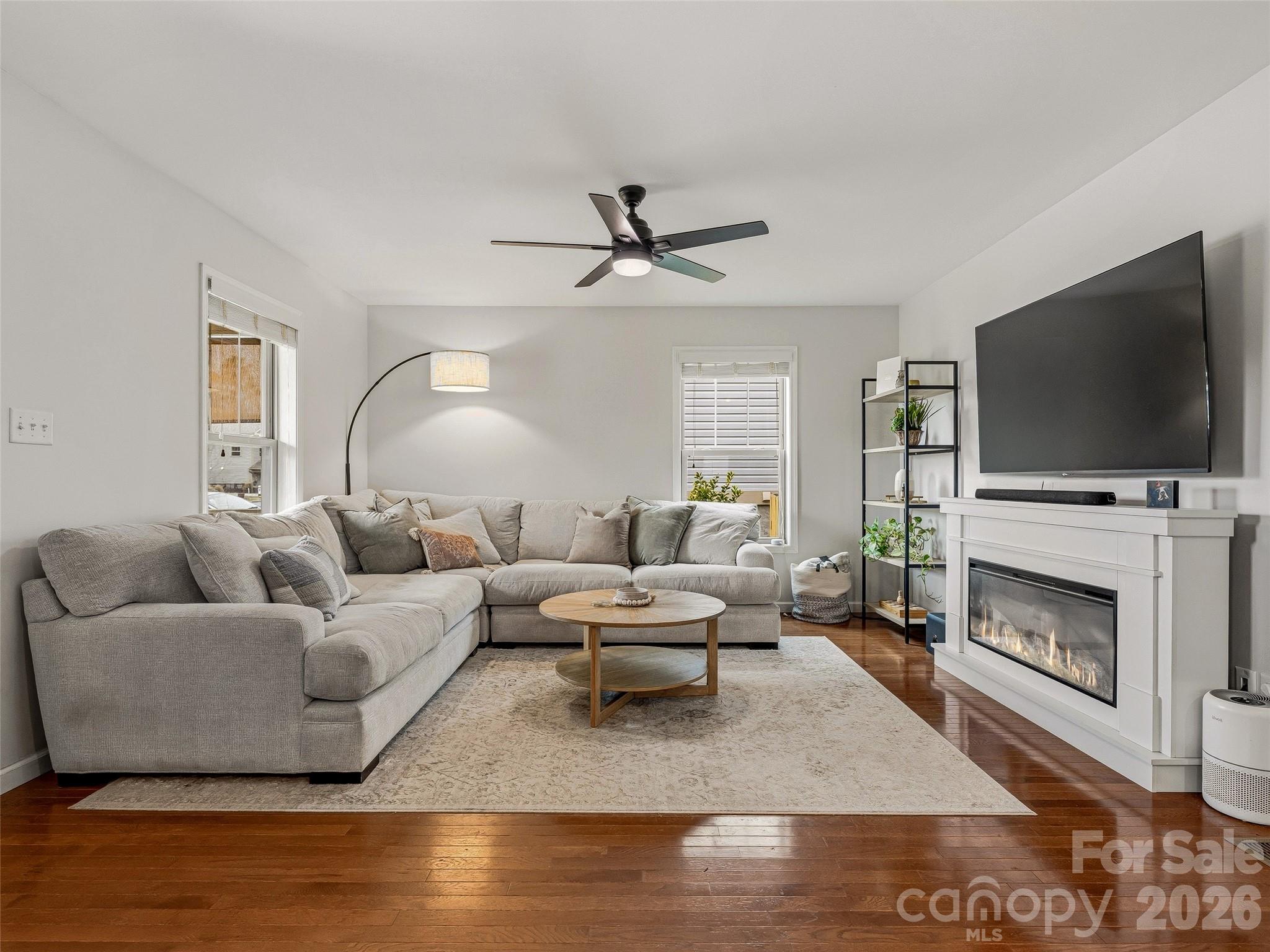 21 Yarrow Meadow Road Weaverville, NC 28787 - Photo 2 of 38 a living room with furniture and a flat screen tv