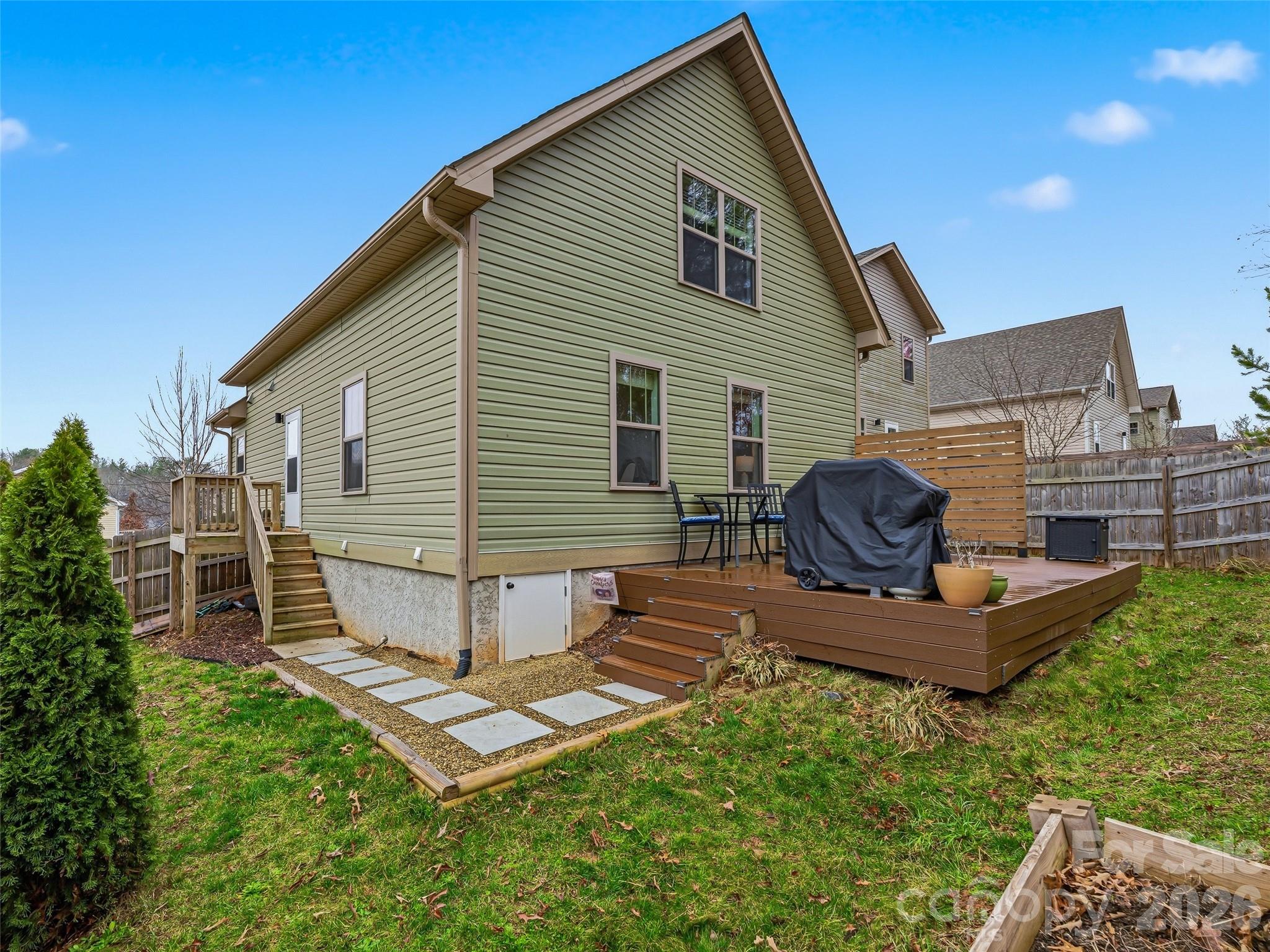 21 Yarrow Meadow Road Weaverville, NC 28787 - Photo 26 of 38 a view of backyard of house with outdoor seating