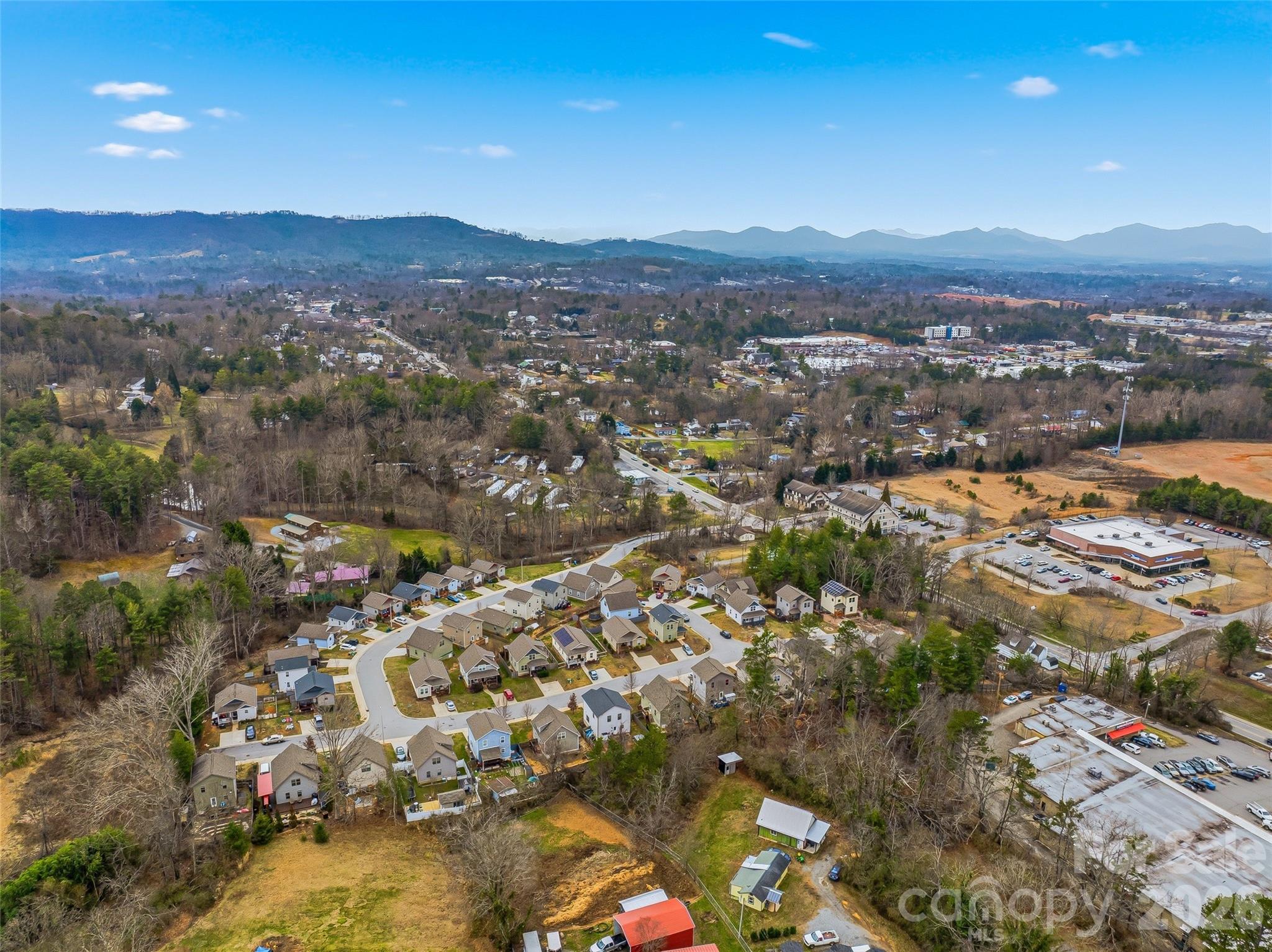 21 Yarrow Meadow Road Weaverville, NC 28787 - Photo 36 of 38 an aerial view of residential houses with outdoor space and trees