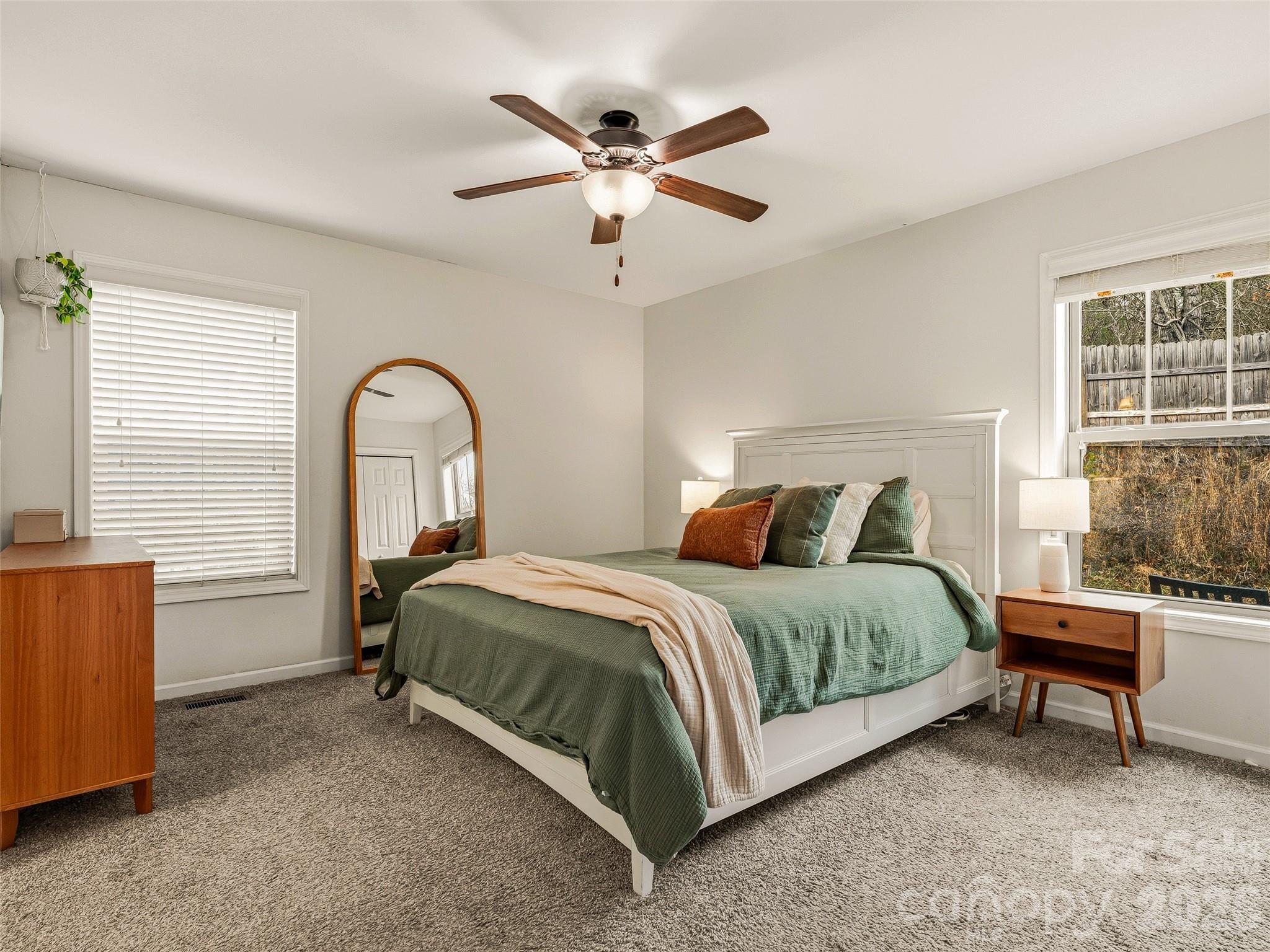 21 Yarrow Meadow Road Weaverville, NC 28787 - Photo 4 of 38 a spacious bedroom with a bed and a table