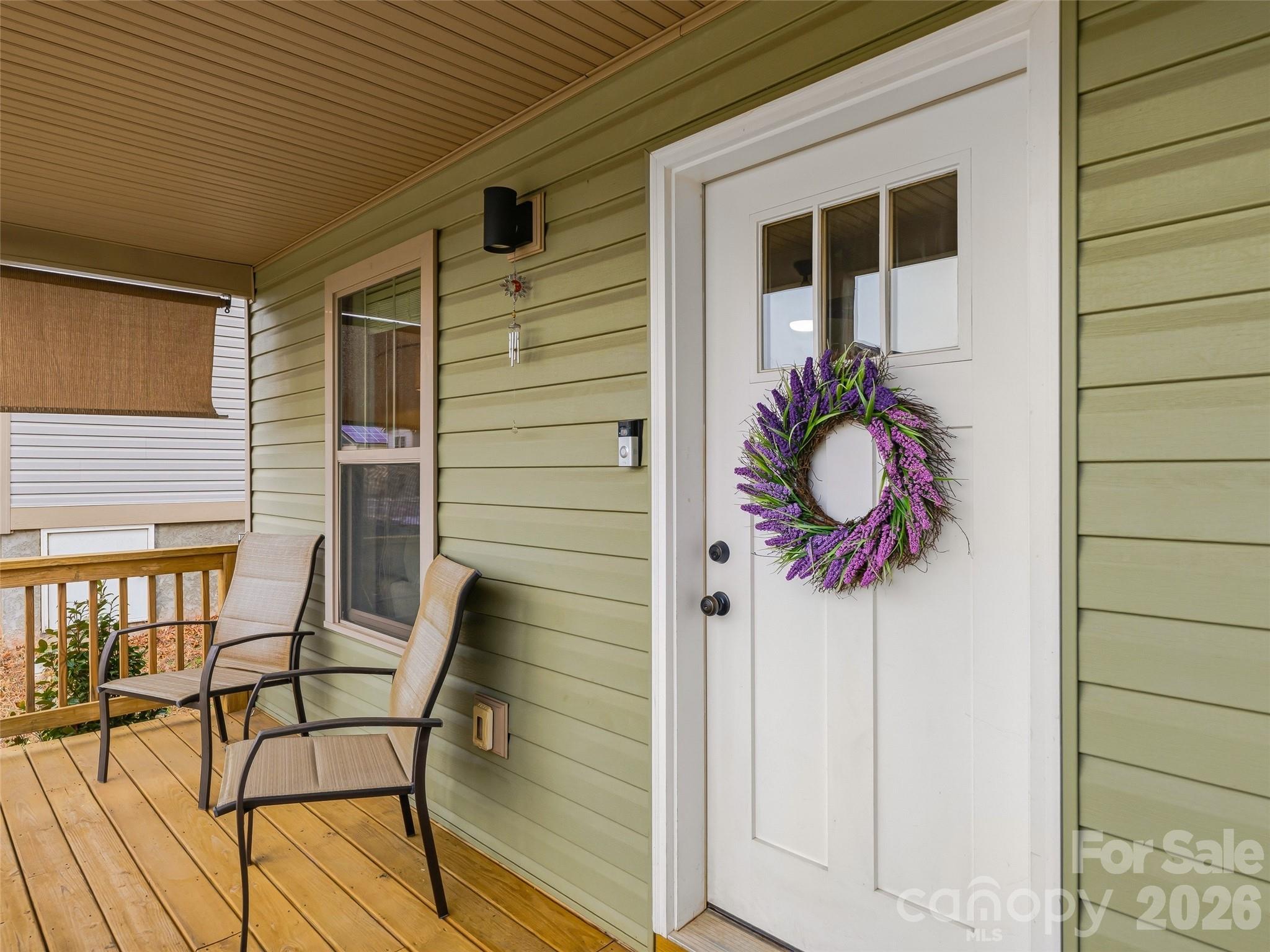 21 Yarrow Meadow Road Weaverville, NC 28787 - Photo 6 of 38 a front view of a house with outdoor seating