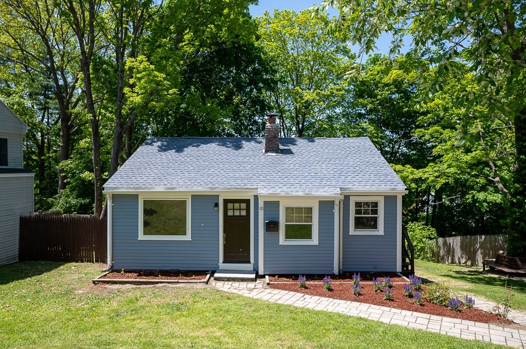10 Maplewood Road Worcester, MA 01602 - Photo 1 of 24 a front view of a house with a yard