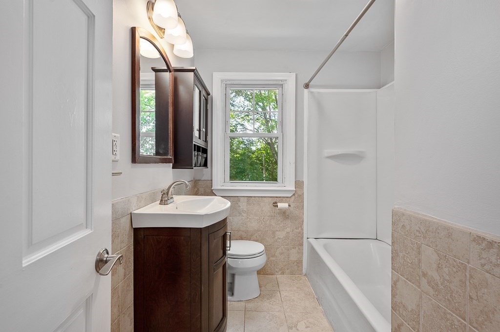 10 Maplewood Road Worcester, MA 01602 - Photo 15 of 24 a bathroom with a sink toilet and mirror