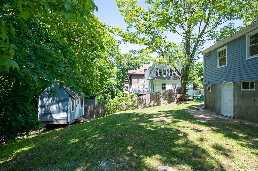 10 Maplewood Road Worcester, MA 01602 - Photo 20 of 24 a front view of a house with a garden