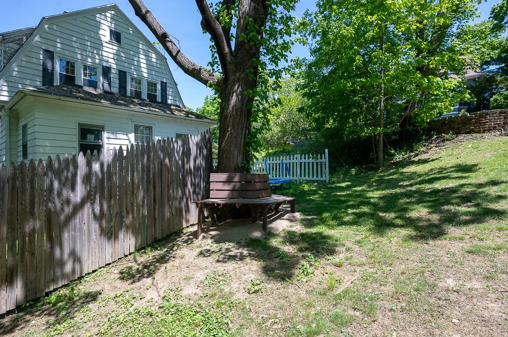 10 Maplewood Road Worcester, MA 01602 - Photo 21 of 24 a backyard of a house with barbeque oven and trees