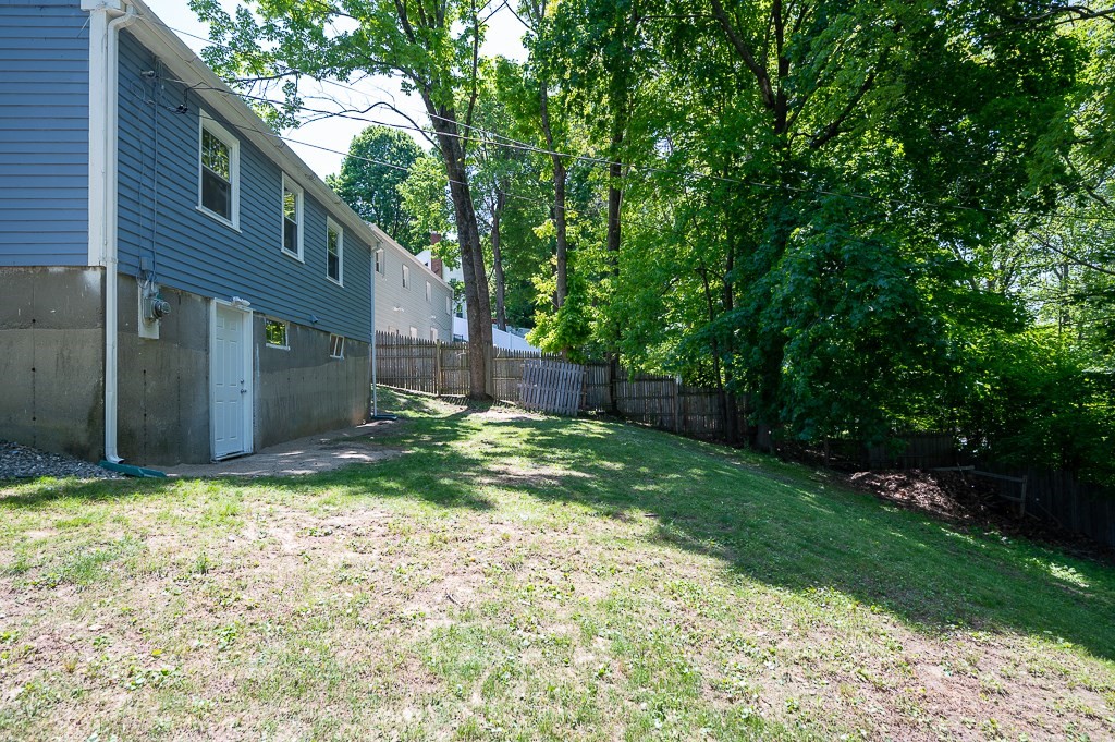 10 Maplewood Road Worcester, MA 01602 - Photo 23 of 24 a backyard of a house with lots of green space