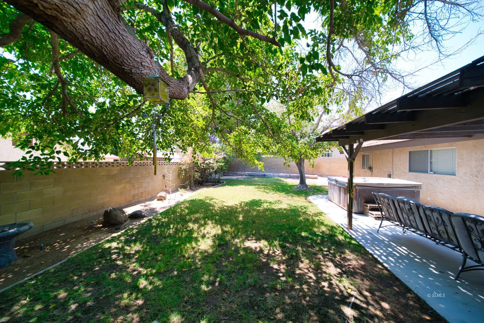 1024 Sherri Street Ridgecrest, CA 93555 - Photo 35 of 41 a backyard of a house with table and chairs