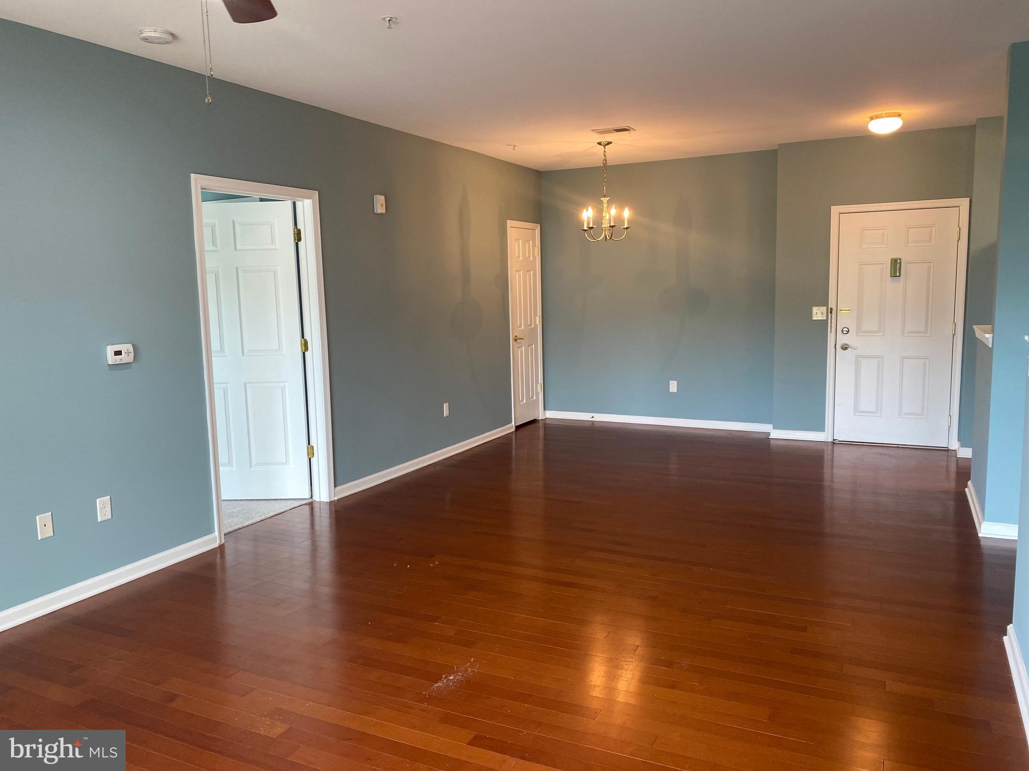 4333 Champions Run Cherry Hill, NJ 08002 - Photo 4 of 14 a view of room with window and wooden floor