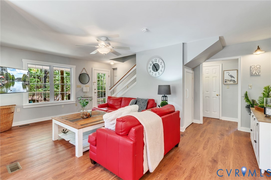 193 Deep Water Lane Reedville, VA 22539 - Photo 4 of 84 a bed room with a bed and a large window