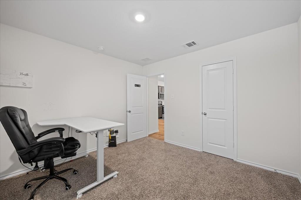 217 Redbarn Lane Caddo Mills, TX 75135 - Photo 13 of 21 a view of a workspace with furniture