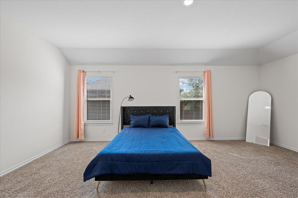 217 Redbarn Lane Caddo Mills, TX 75135 - Photo 15 of 21 a living room with furniture and a fireplace
