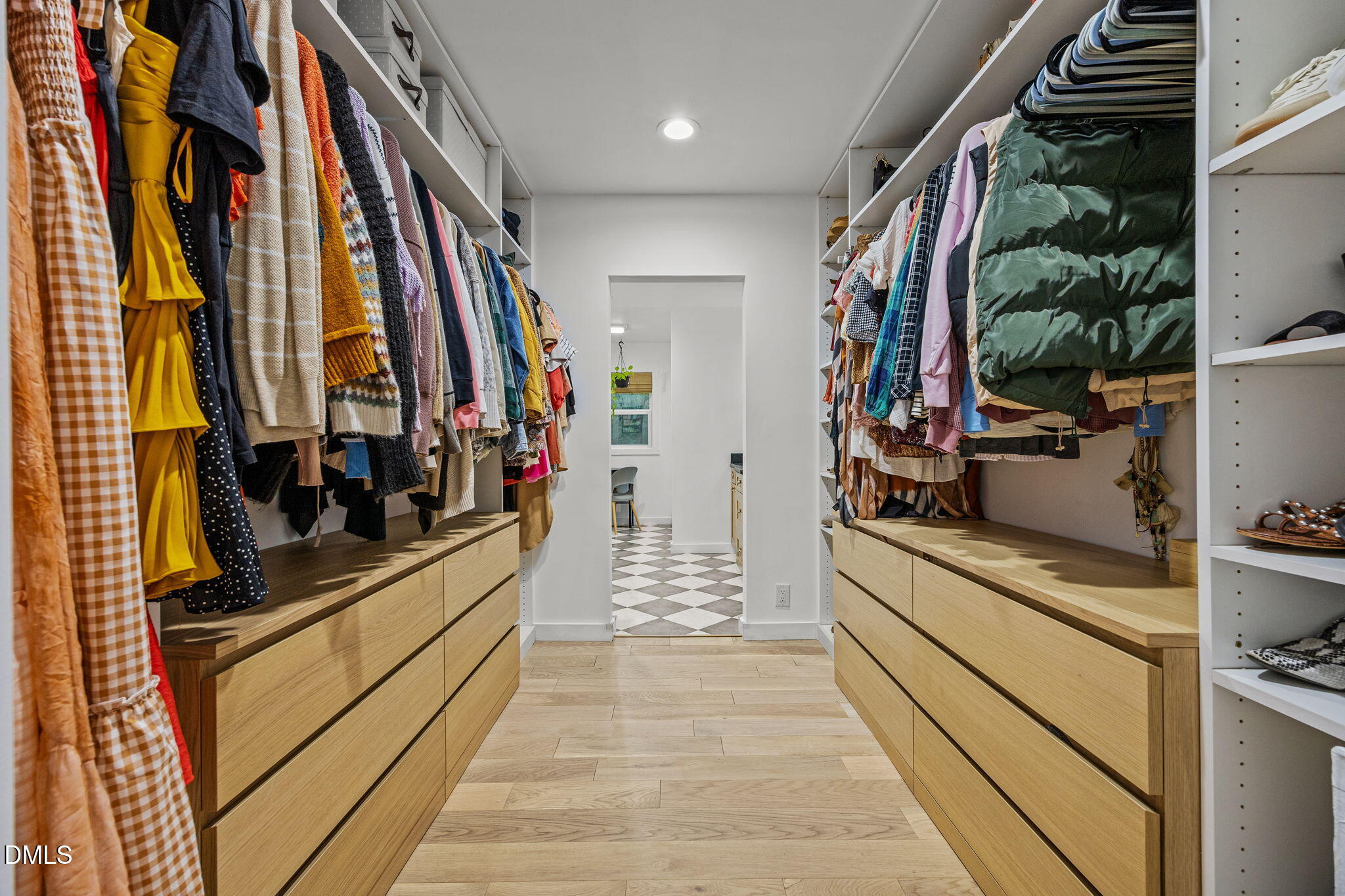320 Dewitt Smith Road Pittsboro, NC 27312 - Photo 15 of 40 a view of walk in closet with clothes and shoes