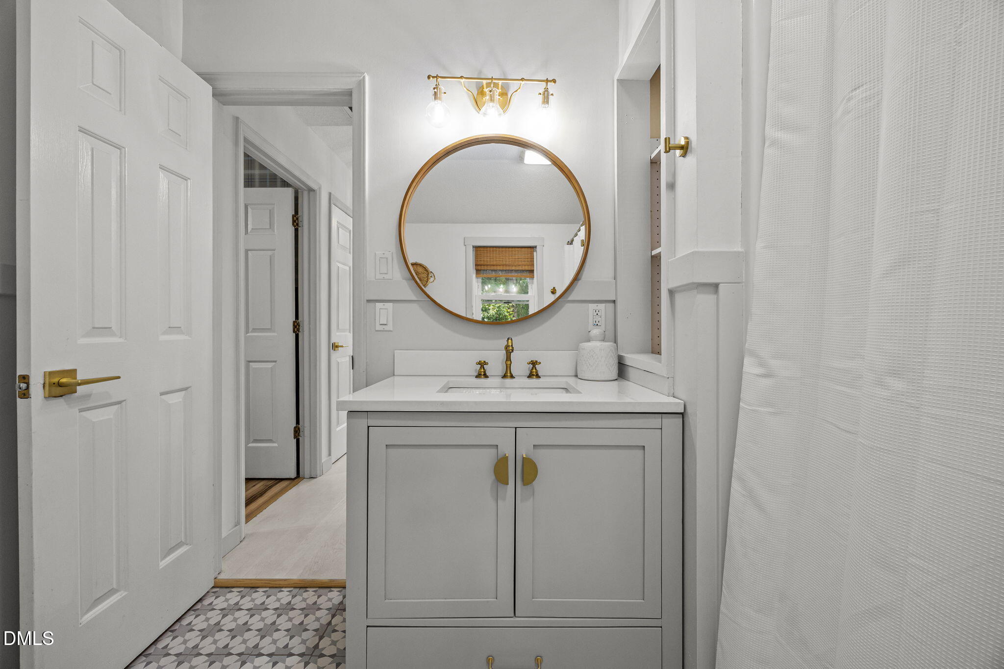 320 Dewitt Smith Road Pittsboro, NC 27312 - Photo 21 of 40 a bathroom with a sink and a mirror