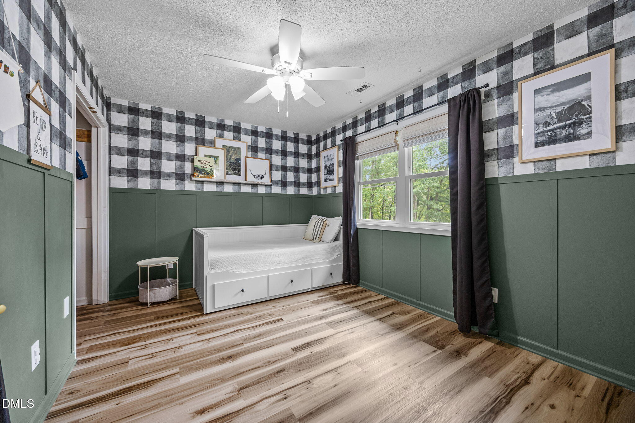 320 Dewitt Smith Road Pittsboro, NC 27312 - Photo 23 of 40 a bedroom with a bed and a window