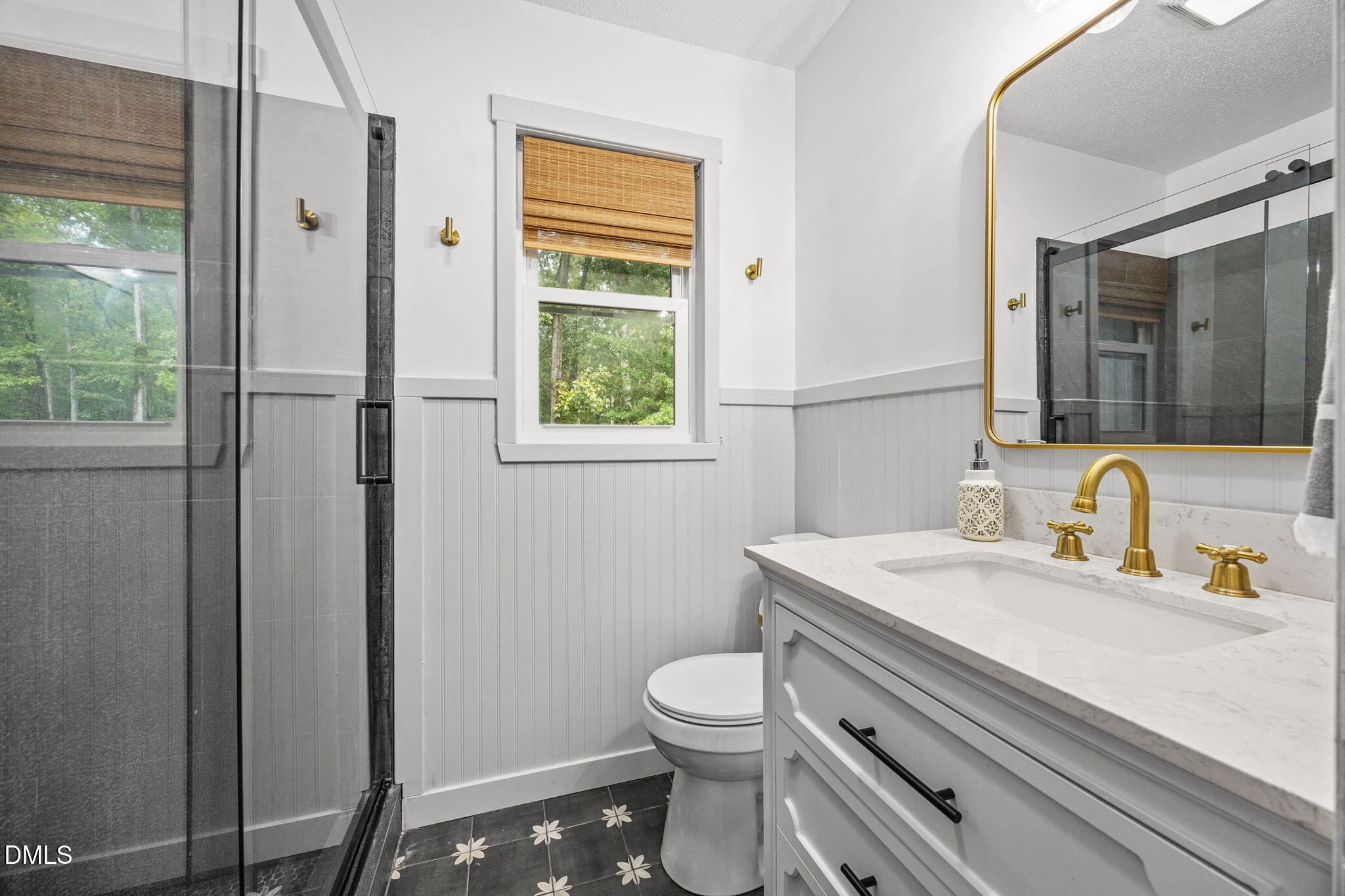 320 Dewitt Smith Road Pittsboro, NC 27312 - Photo 27 of 40 a bathroom with a sink a toilet and shower