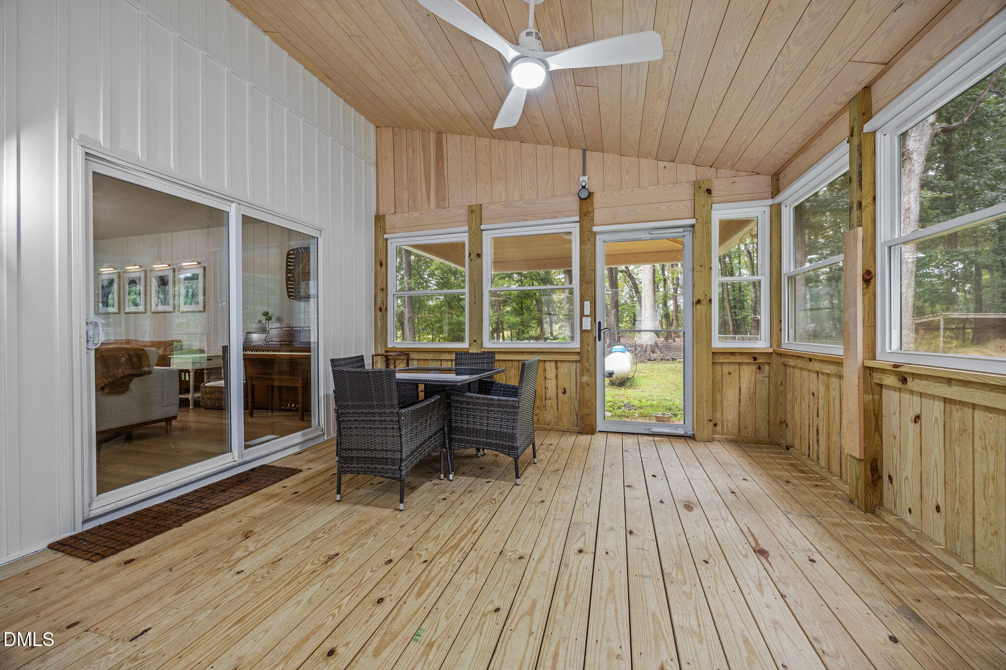 320 Dewitt Smith Road Pittsboro, NC 27312 - Photo 29 of 40 a view of a patio with wooden floor and outdoor seating