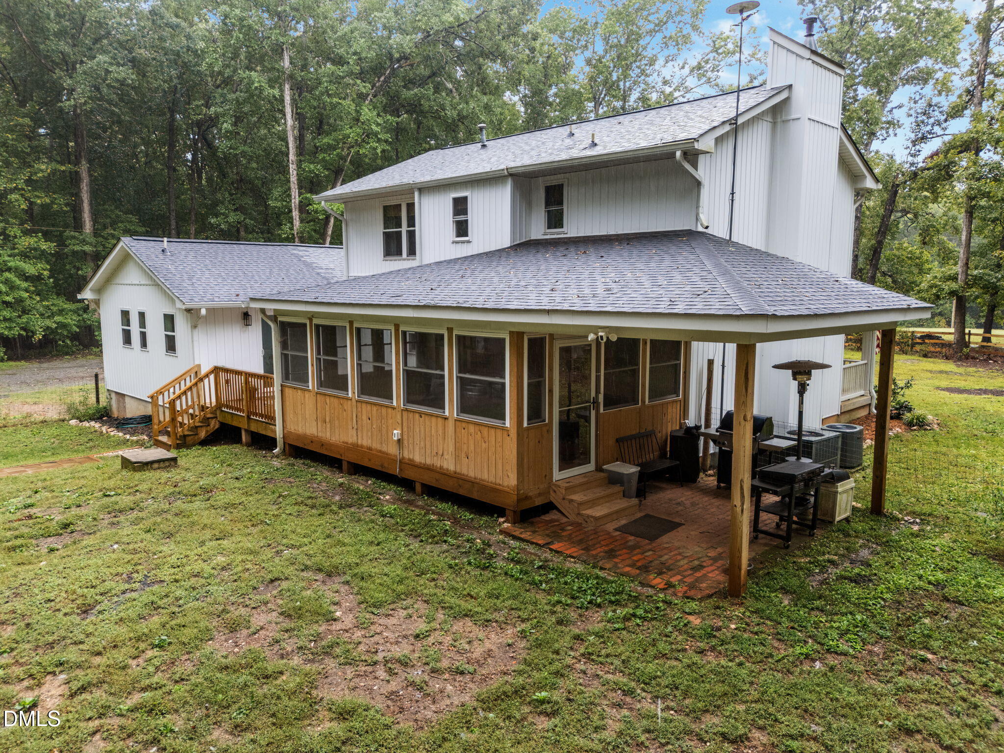 320 Dewitt Smith Road Pittsboro, NC 27312 - Photo 33 of 40 a view of a house with a yard chairs and a table