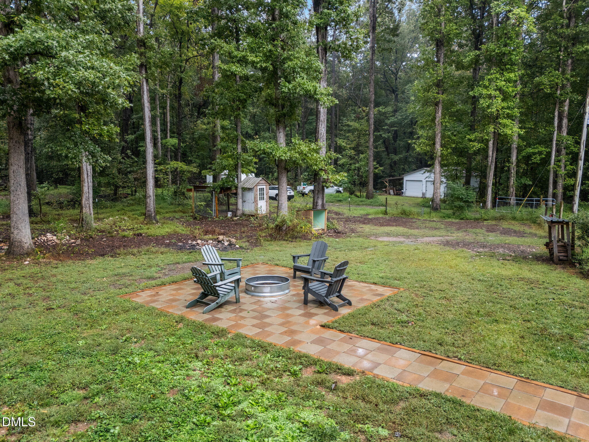 320 Dewitt Smith Road Pittsboro, NC 27312 - Photo 34 of 40 a view of a park with sitting area and a slide