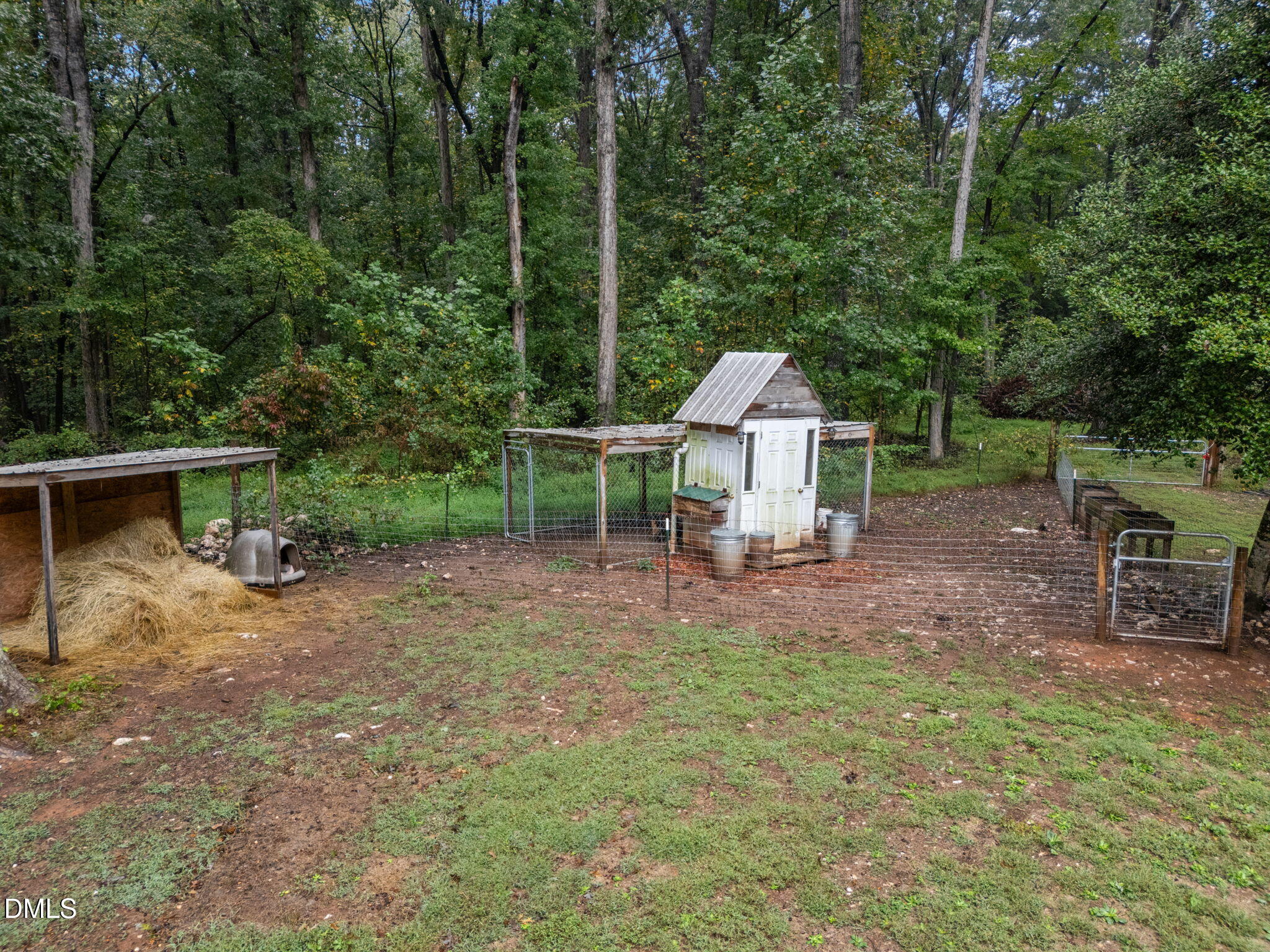 320 Dewitt Smith Road Pittsboro, NC 27312 - Photo 37 of 40 a view of a chair and table in the yard