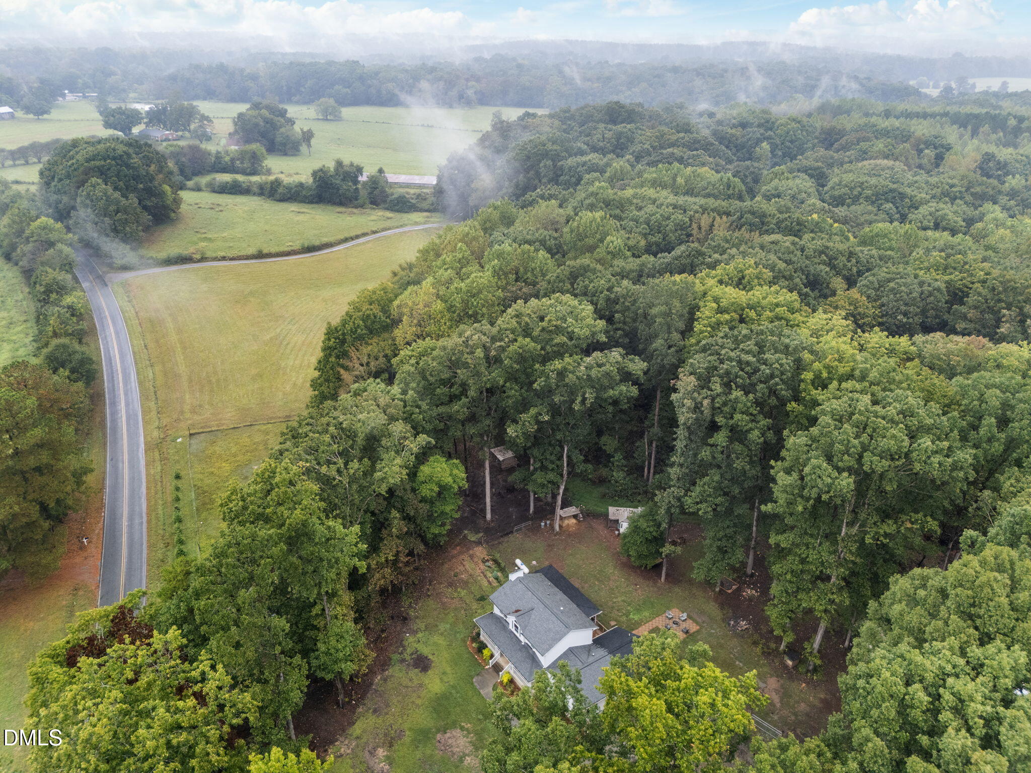 320 Dewitt Smith Road Pittsboro, NC 27312 - Photo 40 of 40 an aerial view of a house with yard