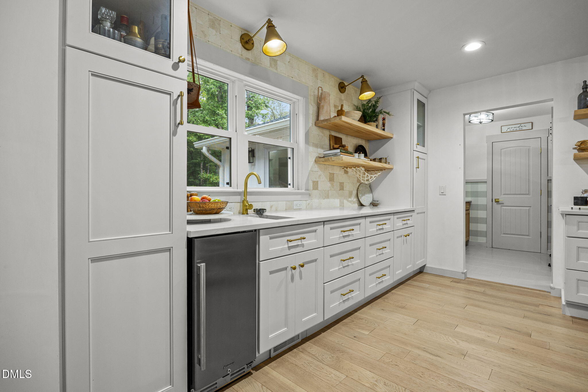 320 Dewitt Smith Road Pittsboro, NC 27312 - Photo 7 of 40 a bathroom with a granite countertop sink mirror and window