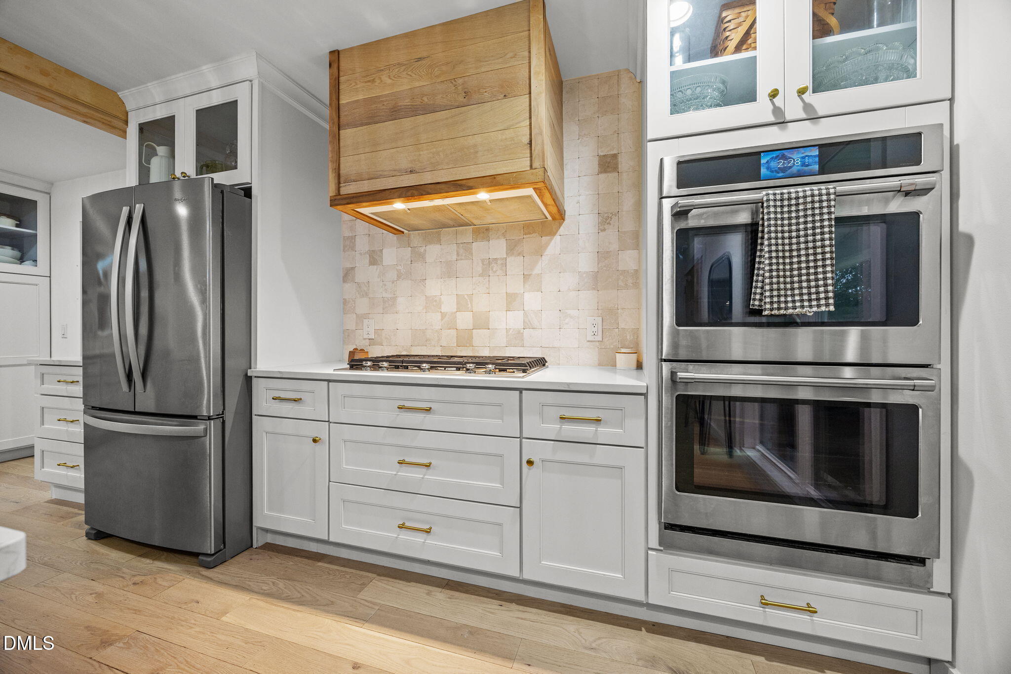 320 Dewitt Smith Road Pittsboro, NC 27312 - Photo 10 of 40 a kitchen with granite countertop cabinets stainless steel appliances and a counter space