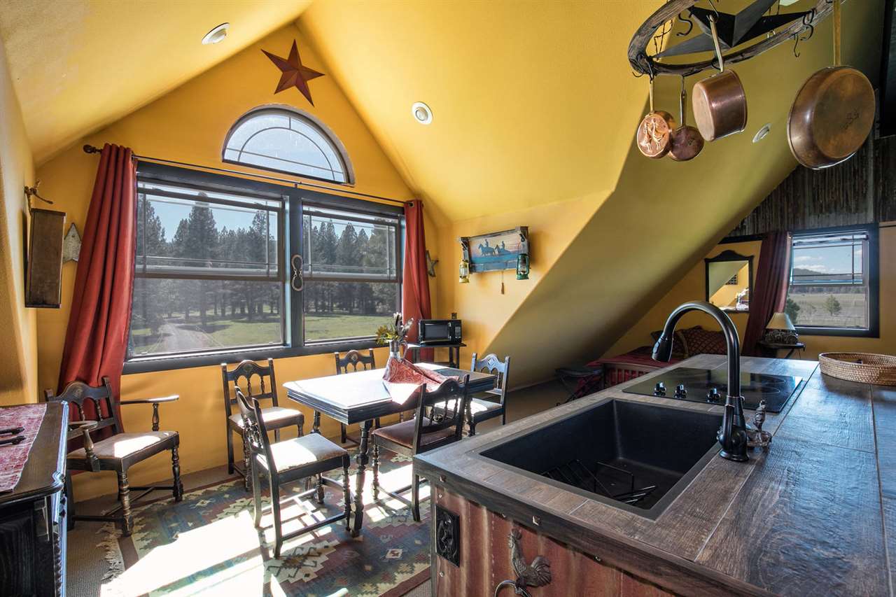 21040 Highway 89 Calpine, CA 96124 - Photo 12 of 21 a view of living room and kitchen with furniture
