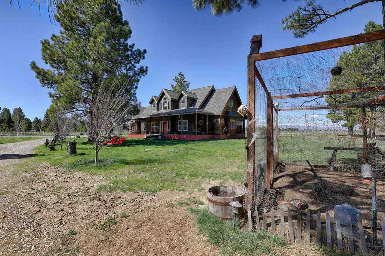 21040 Highway 89 Calpine, CA 96124 - Photo 18 of 21 a view of a chair and table in backyard of the house