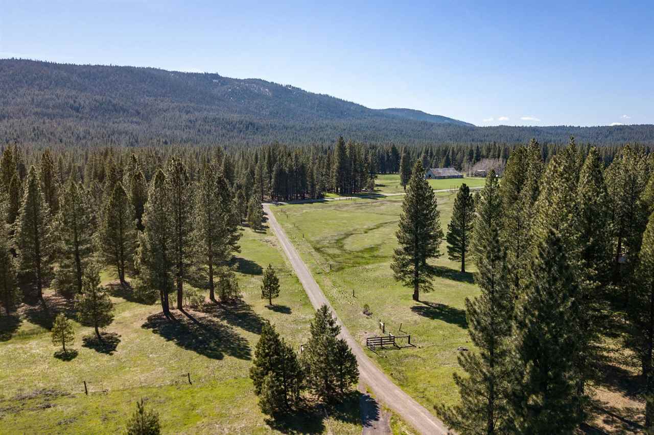 21040 Highway 89 Calpine, CA 96124 - Photo 20 of 21 a view of a lake with a mountain