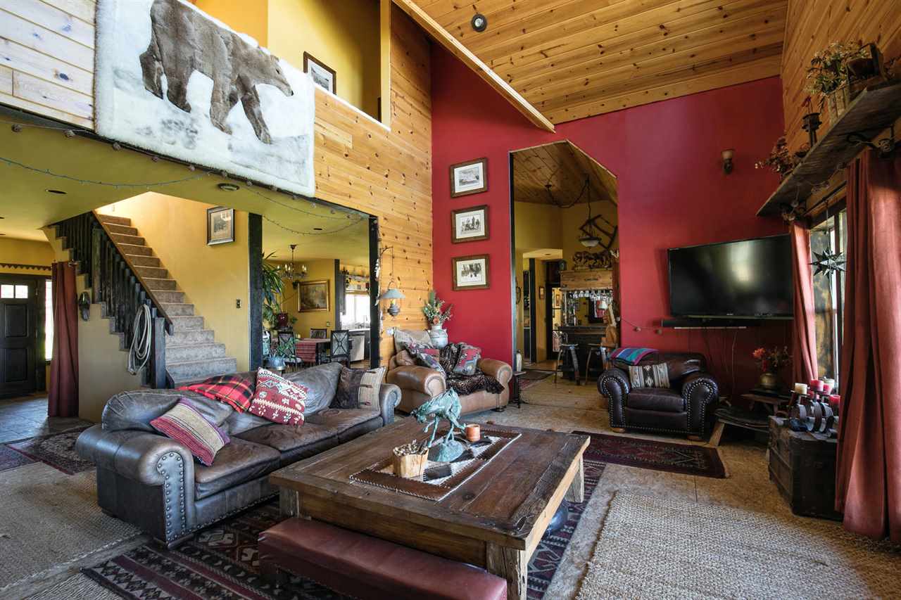 21040 Highway 89 Calpine, CA 96124 - Photo 5 of 21 a living room with furniture and a flat screen tv