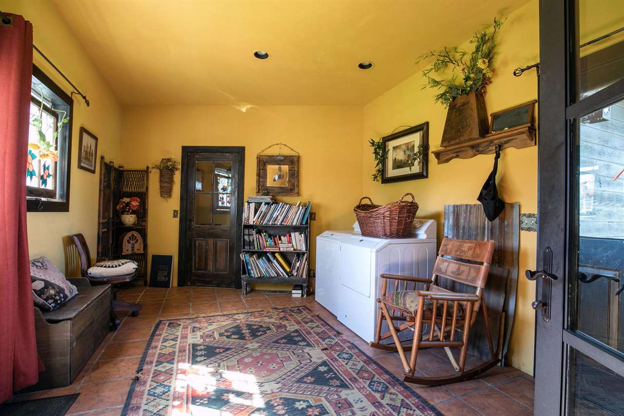 21040 Highway 89 Calpine, CA 96124 - Photo 8 of 21 a living room with furniture and a rug