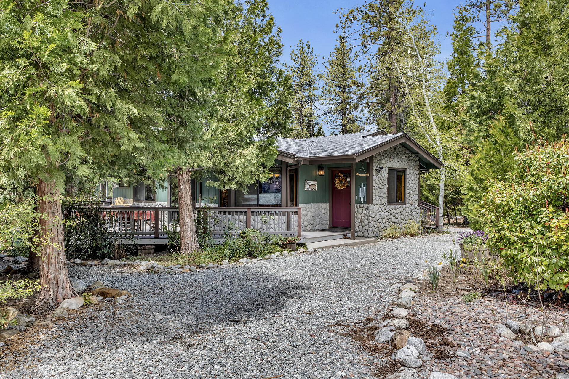 54580 Reed Lane Idyllwild, CA 92549 - Photo 29 of 101 a front view of a house with a yard and trees