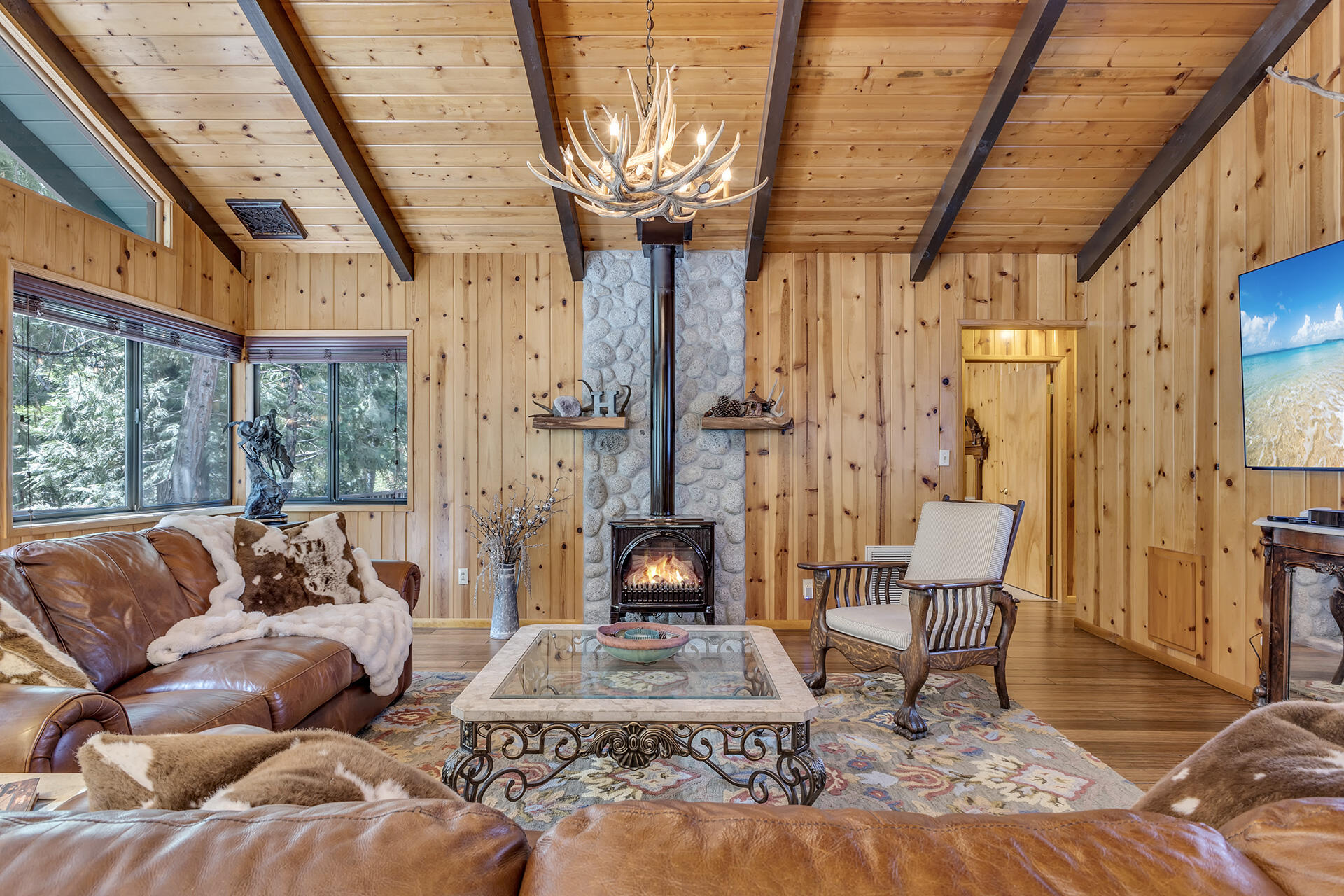 54580 Reed Lane Idyllwild, CA 92549 - Photo 34 of 101 a living room with furniture and a fireplace