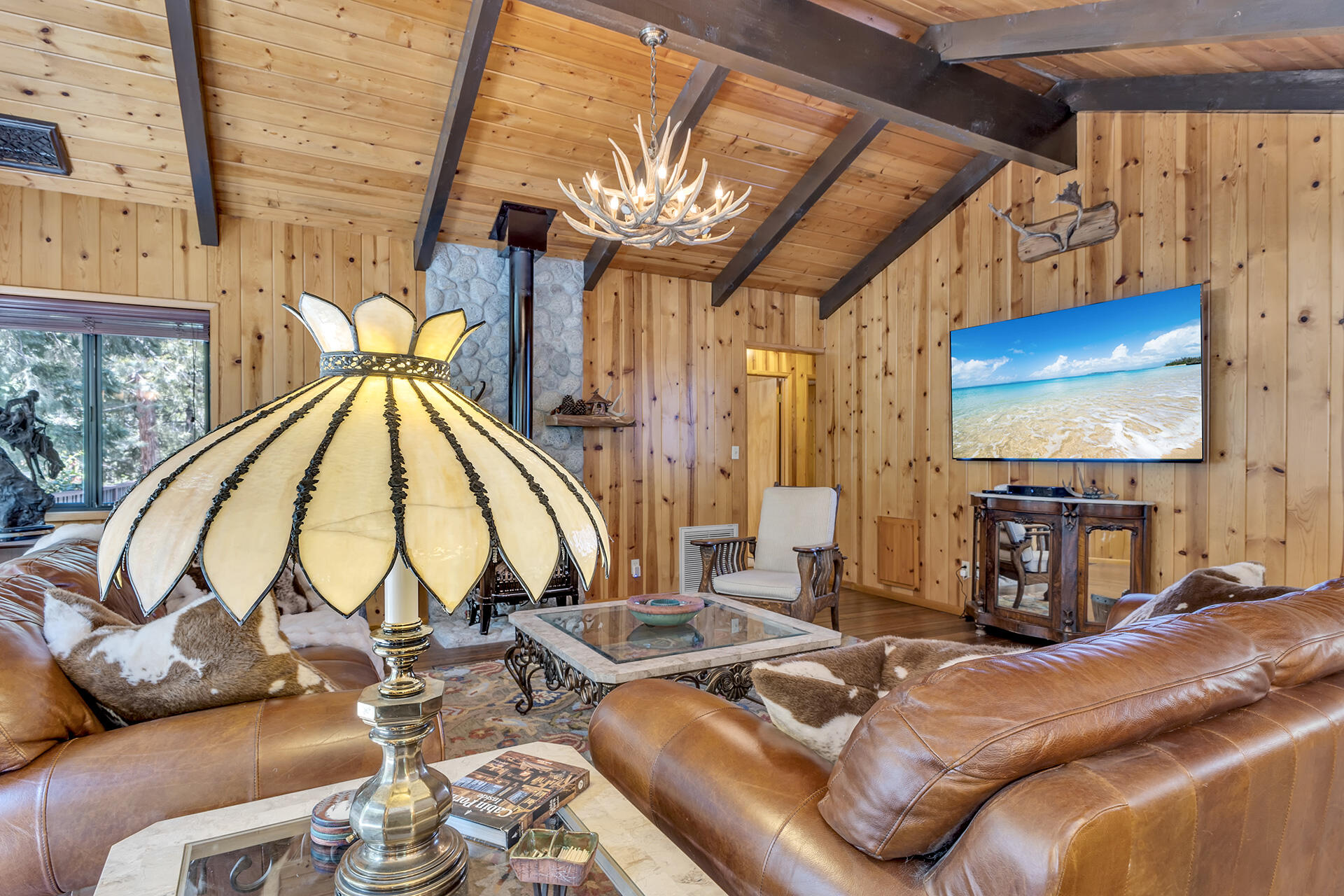 54580 Reed Lane Idyllwild, CA 92549 - Photo 35 of 101 a view of a livingroom with furniture and a flat screen tv