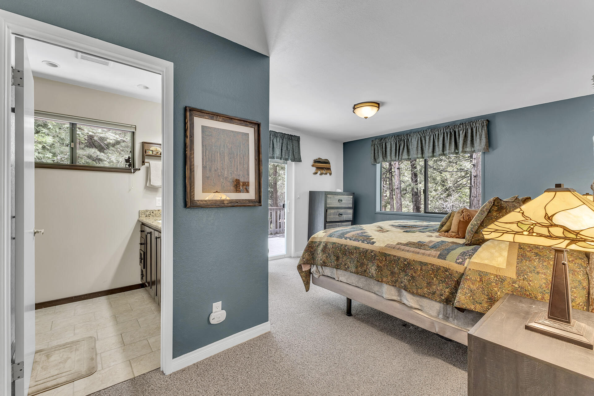 54580 Reed Lane Idyllwild, CA 92549 - Photo 7 of 101 a bed sitting in a bedroom next to a window