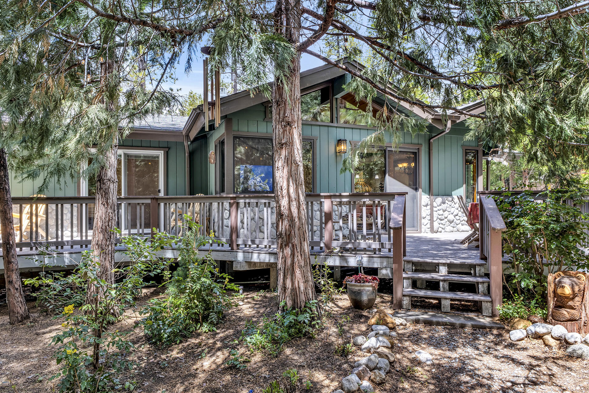 54580 Reed Lane Idyllwild, CA 92549 - Photo 82 of 101 front view of a house with a bench